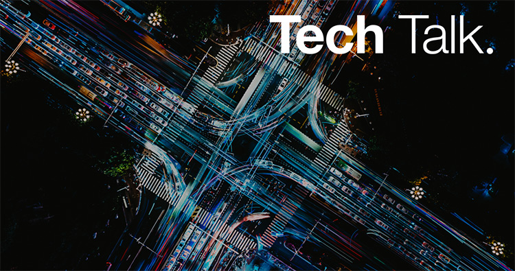 Aerial view of a busy cross section of roads at night